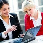 2513177-portrait-of-two-successful-business-women-working-together-business-woman